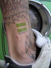 lable tattoo on ankle
